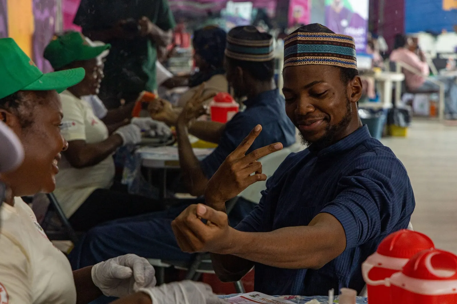 A OnePint Plus volunteer sharing a warm moment with a donor